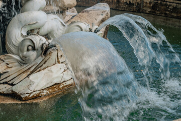 closeup of water jet from ornamental fountain, aranjuez island garden, madrid