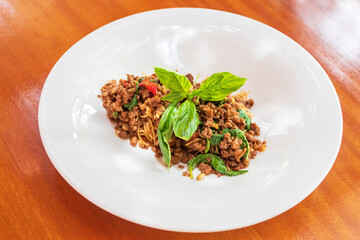 Spaghetti with mince wagyu, chili, dried chili, garlic, olive oil and hot basil. 