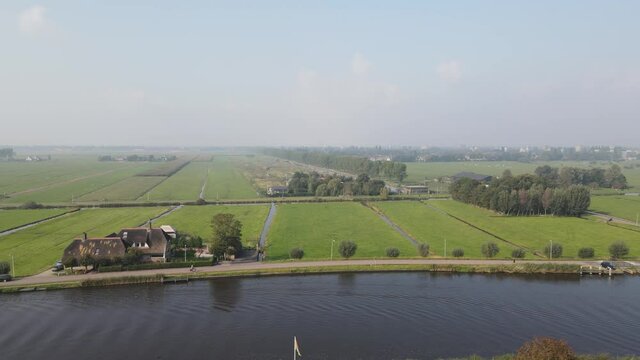 Aerial view of Amstelveen Oudekerk ad Amstel typical dutch landscape and historic village along the Amstel river in The Netherlands.