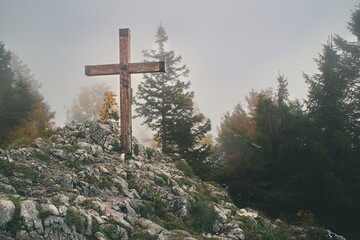 Summit cross in high fog