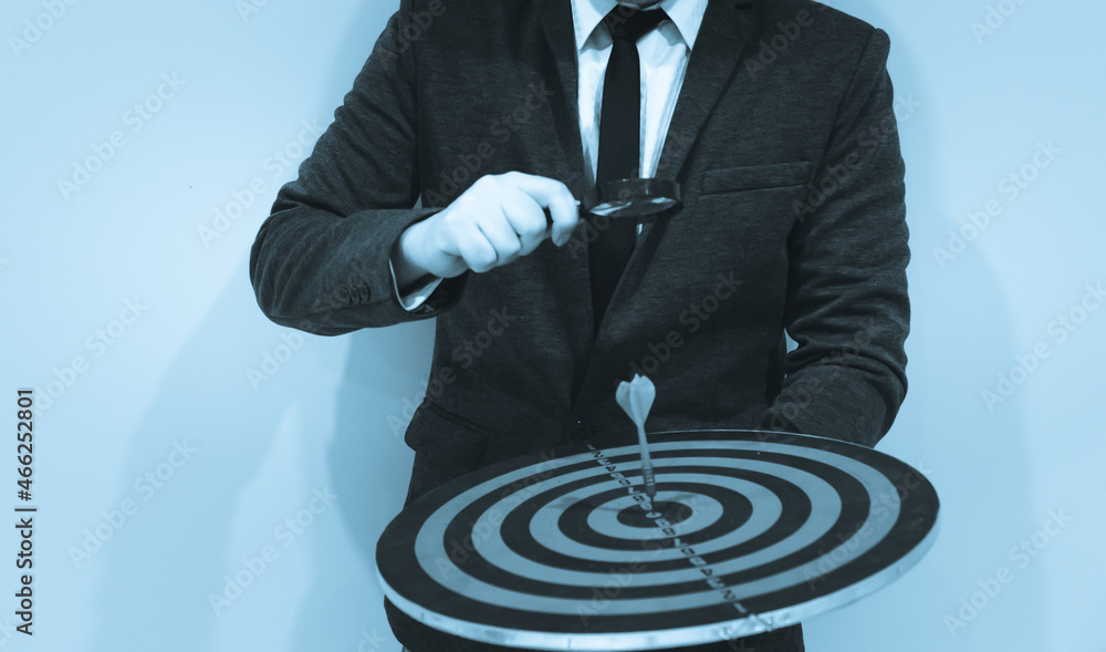 Poster bullseye is a target of business. dart is an opportunity and dartboard is the target and goal. so bo