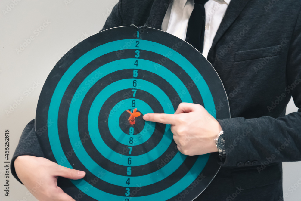 Poster bullseye is a target of business. dart is an opportunity and dartboard is the target and goal. so bo