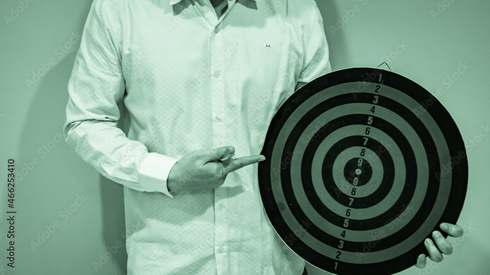 Poster bullseye is a target of business. dart is an opportunity and dartboard is the target and goal. so bo