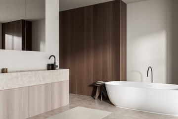 Fototapeta na wymiar Bathroom interior with light wooden and concrete sink with bathtub. Copy space