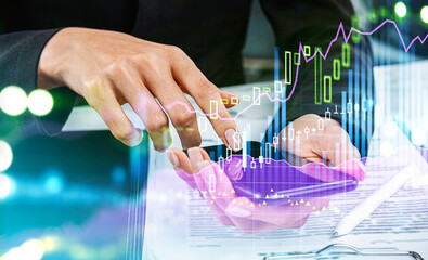 Businesswoman wearing formal suit is typing message on smartphone