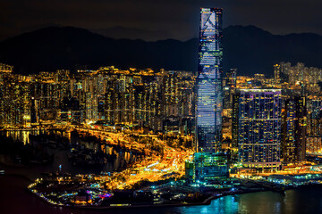 Illumination of Hong Kong Skyscrapers at Night on Kowloon Island, Hong Kong 