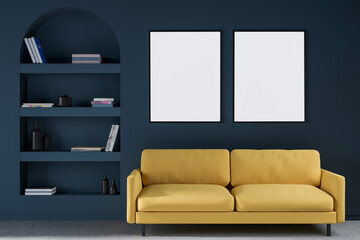 Two canvases on dark blue wall of living room with yellow sofa