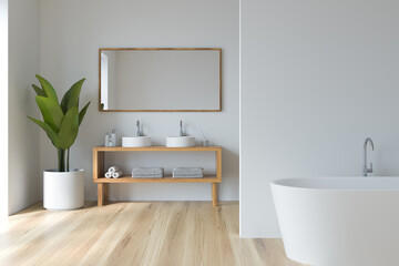 White bathroom interior with tub, two sinks and shelf with mirror. Mockup