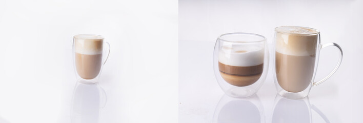 Cups with cappuccino coffee stand on a white background