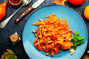 Delicious meat salad with pumpkin