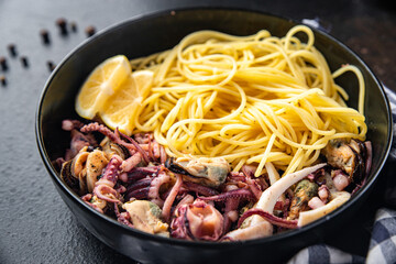 seafood pasta spaghetti mussel, squid, octopus, shrimp fresh meal snack copy space food background 