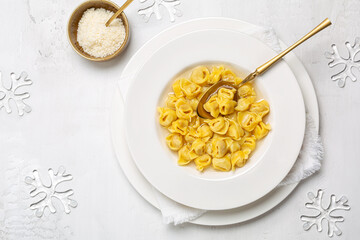 Tortellini. Pasta stuffed with a mix of meat, parmigiano cheese and served in capon broth....