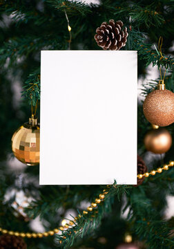 mockup christmas greeting card for invitation design on christmas tree background.