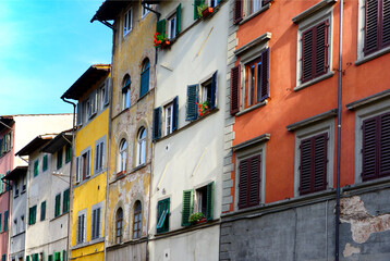 Fototapeta na wymiar facades with traditional wooden shutters in sunshine, Via di San Niccolo, San Niccolo street, historic part of Florence, UNESCO, World Heritage site, Florence, Firenze, tuscany, Italy, Europe