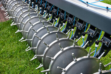 Fototapeta na wymiar New modern agricultural machinery and equipment details