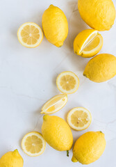 food styling lemons on a marble background. ingredients on background