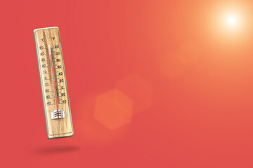 thermometer shows high temperature on red background. temperature of the weather in summer. with...