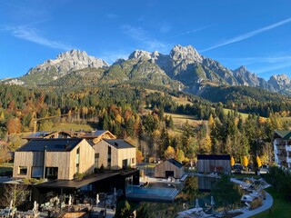 View from hotel window in Leogang village on the mountain range Leoganger Steinberge in the Alps mountains background Austria