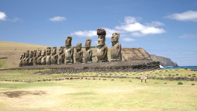 Moai statues Ahu Tongariki side on Easter Island, Chile. Statues of Easter Island in Chile. Mysterious Giant megalith Moai statues. Stunning shot of mysterious monoliths on a perfect sunny day.