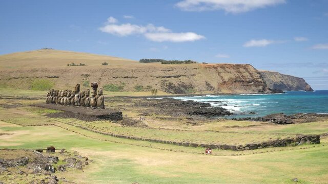 Moai statues Ahu Tongariki side on Easter Island, Chile. Statues of Easter Island in Chile. Mysterious Giant megalith Moai statues. Stunning shot of mysterious monoliths on a perfect sunny day.