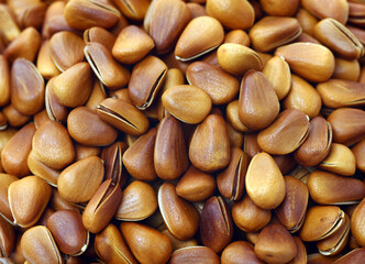 Closeup of shelled raw pine nuts