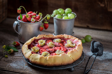 Sweet tart with fresh berry fruits. Berries tart with sugar.