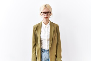 Beautiful caucasian business woman standing over isolated background skeptic and nervous, frowning upset because of problem. negative person.