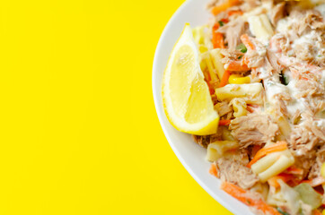 Cavatelli pasta with tuna and iceberg lettuce, carrots, sweet corn and cucumber in a sauce mayonnaise