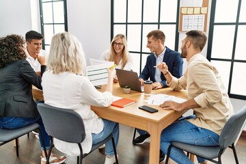 Group of business workers smiling happy working at the office.