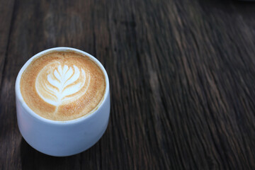 A cup of coffee on table. There has space for writing
