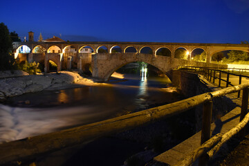 night view of the Roman bridge in piedmont