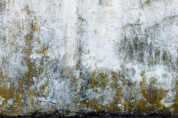 Naturalne tło postarzanego muru z teksturą pęknięć.  Kolory korozji w stonowanych odcieniach szarości i brązu, pomarańczowy.	