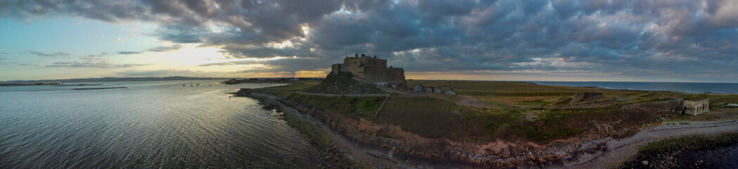 Summer evening view of Lindisfarne Castle on Holy Island, Northumberland