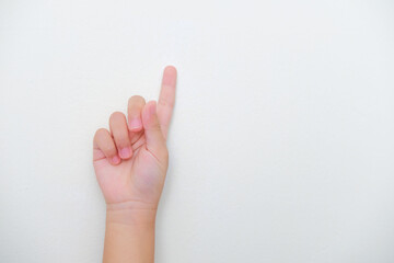 Obraz premium Kid hand pointing one finger up