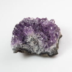 natural violet amethyst druse cluster on the white background