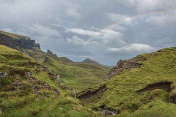 Fototapeta na wymiar Beautiful view over The Quiraing, Isle of Skye. Scotland with rainbow