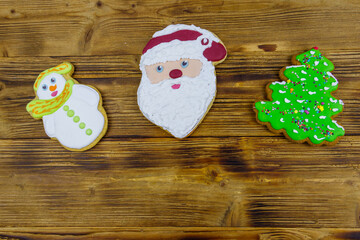 Christmas gingerbread cookies on a wooden table. Top view