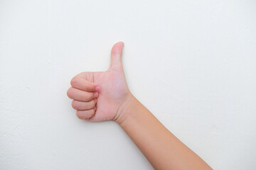 Kid hand giving thumb up