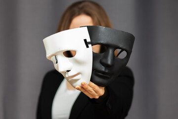 psychology and psychiatry,mental health,mind and feelings,two facial masks black and white in the...