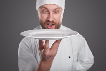 Comic chef with empty plate