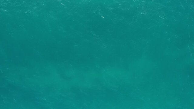 Beautiful Sea wave in summer season Footage from drone aerial view Amazing ocean sea surface background Drone flying over sea