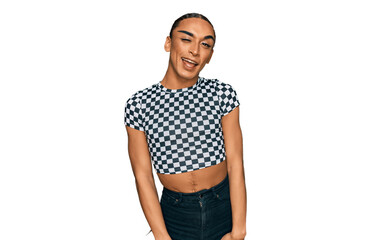 Fototapeta premium Hispanic transgender man wearing make up and long hair wearing modern clothes winking looking at the camera with sexy expression, cheerful and happy face.