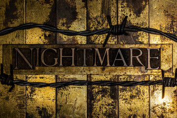 Nightmare text message with barbed wire on textured grunge copper and vintage gold background