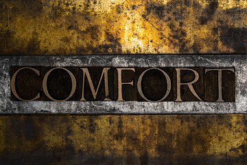 Comfort text message on textured grunge copper and vintage gold background