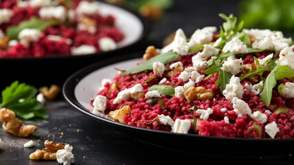 Bulgur salad with beetroot, walnuts, arugula and feta cheese. Healthy diet food