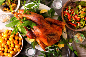 Festive dinner with roast wild turkey and other dishes