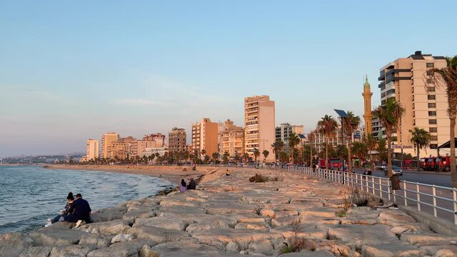 The city of Sidon in Lebanon. Sidon Sea Castle, built by the crusaders - Saida corniche and building. Sidon sea at sunset