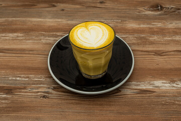 Made with turmeric, cinnamon, cocoa, ginger, pepper, and other spices; known as Golden latte for being frothy and for its bright yellow color, layered with warm and delicious flavors
