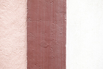 Wall with three vertical parts.