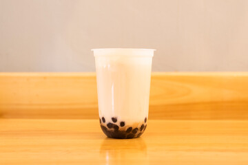 Green tea with bubbles or pearls, also known for its anglicized bubble tea or also as boba, is a...